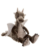 Plush dragon toy on a white background