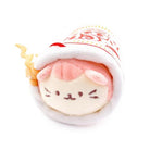 Plush toy in a takeout container.