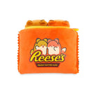 Orange plush pouch with cartoon Reese's logo and two brown cat-shaped coin purses attached to the top.