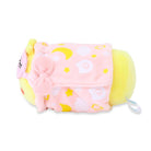 Yellow plush toy wrapped in a pink blanket with stars, moons, and clouds.