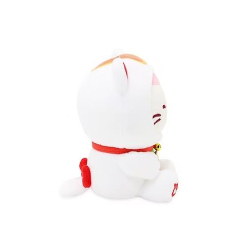 White plush cat toy with red belt and bell on a white background