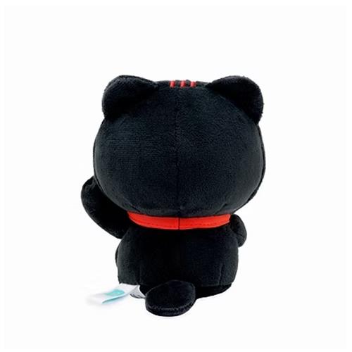 Black plush toy with a red belt on a white background