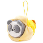 Panda plush toy in a banana costume.