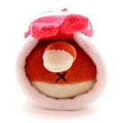 Plush toy with pink hat and orange body, white trim and bottom.