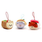 Three plush animal ornaments that resemble food. A bunny is in a taco, an owl is in a sandwich, and a fox is in a sushi roll.