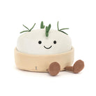 White plush cheese-shaped toy with green herb tufts and brown corduroy feet, by Jellycat, front view with smiling face and ribbed rind.