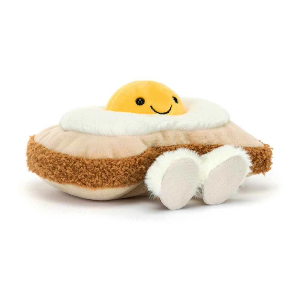 Plush fried egg with a smiling face.