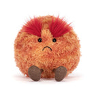 Orange fuzzy plush planet Mars toy by Jellycat with red spiky hair, black beady eyes, frowning mouth, and brown textured feet, front view.
