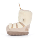 A single baby bootie with a plush cream sheepskin-like collar and toe, a beige suede-like body, and a brown sole, shown from the side on a white background.