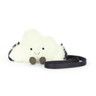 White fluffy cloud-shaped shoulder bag with smiling face and brown feet by Jellycat, featuring black strap, front view