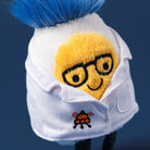 Plush boiled egg toy in white lab coat with black glasses, blue fuzzy hair, and embroidered beaker patch, front view