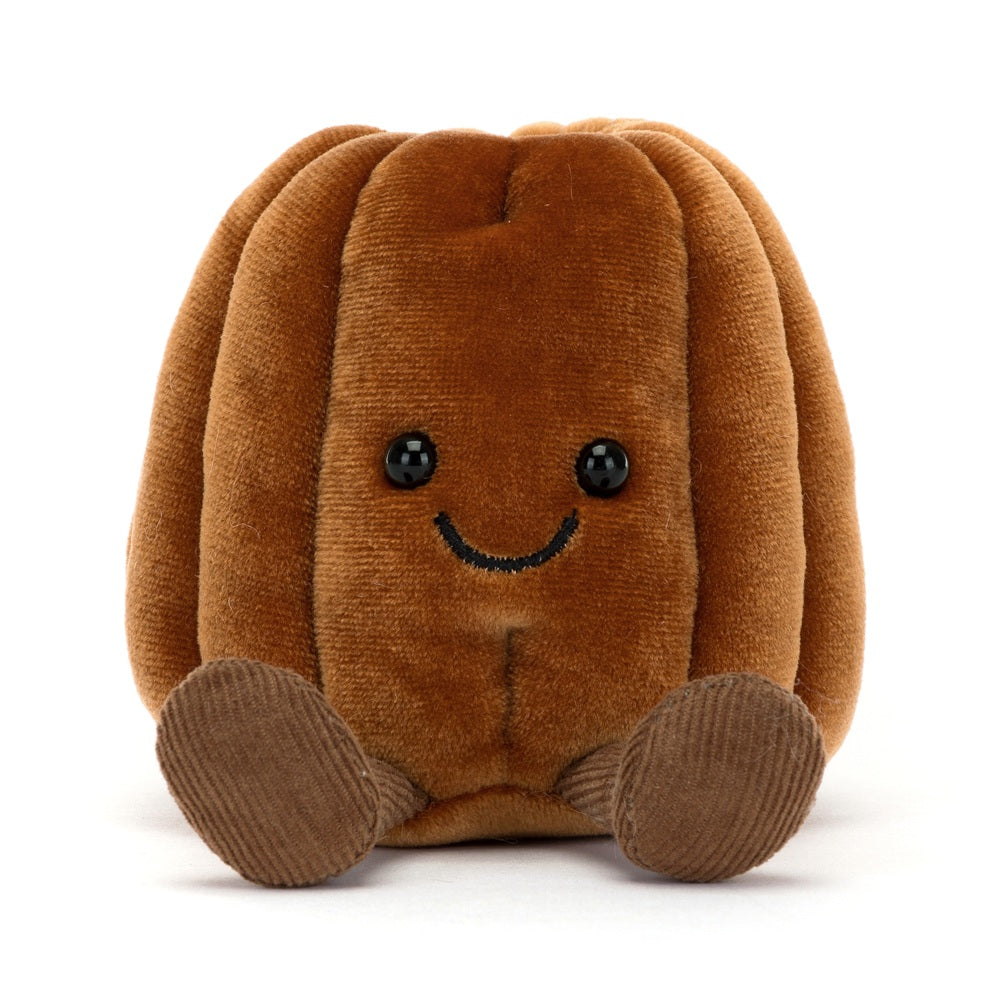 Brown plush toy with a smiling face on a white background
