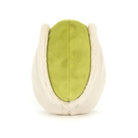 Close-up of a plush pistachio toy.