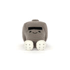 Plush toy resembling a robot with a smiling face on a white background