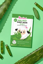 Product shot of Purriso Real Fruit Aloe Sheet Mask for kids, with aloe vera leaves on a green background.