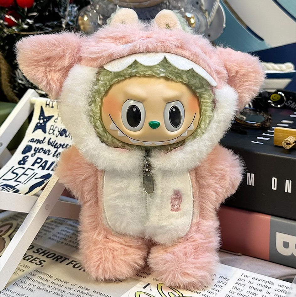 A plush toy in a pink furry monster costume.
