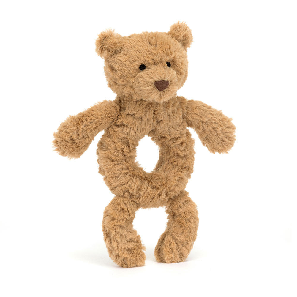 Brown teddy bear plush toy with a hole in the middle.
