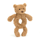 Brown teddy bear plush toy with a hole in the middle.
