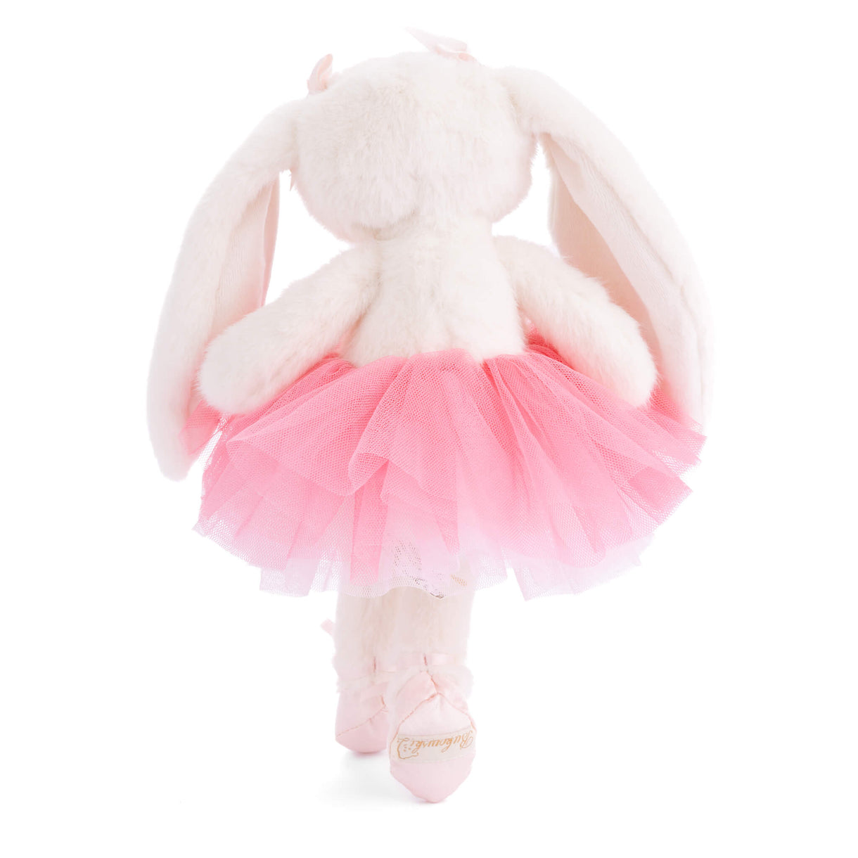 Plush bunny toy in a pink tutu on a white background