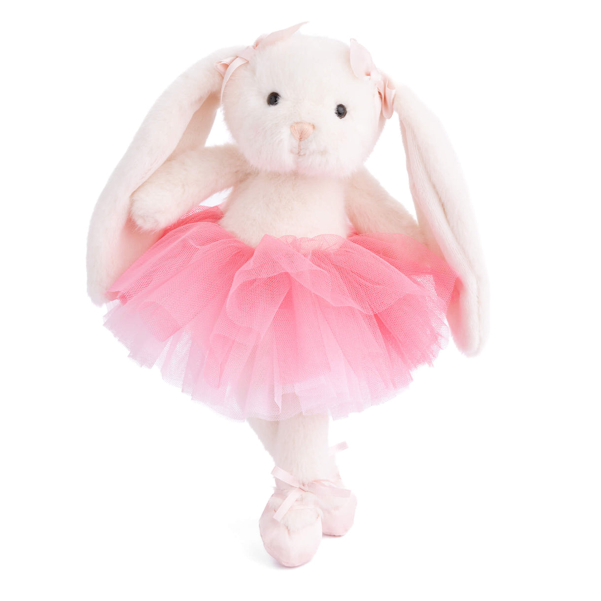 Plush rabbit toy in a pink tutu on a white background