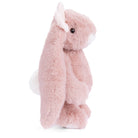 Plush toy elephant with pink color on a white background
