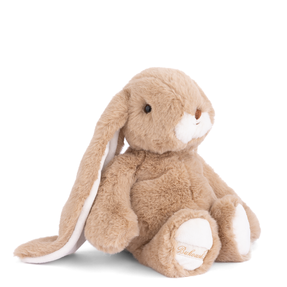 Brown plush bunny toy on a white background