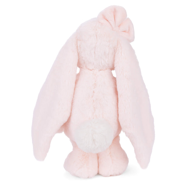 Pink plush bunny toy on a white background