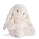 White plush bunny with a bow on a white background