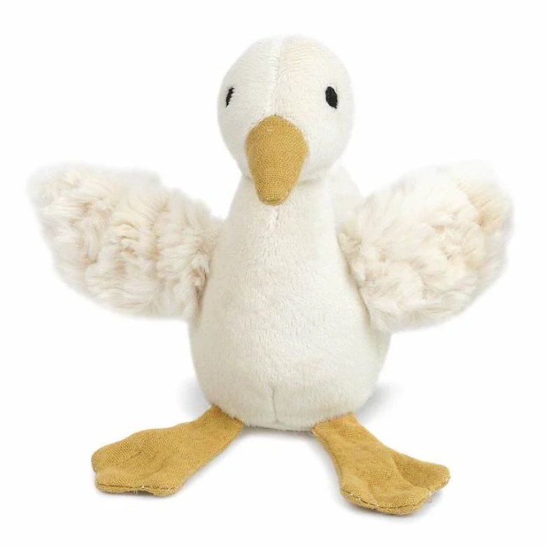 Plush toy goose with white body and yellow feet and beak on a white background