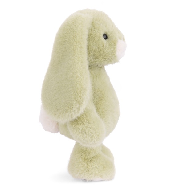 Green plush toy on a white background