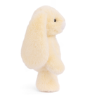 Small plush toy resembling a seal on a white background