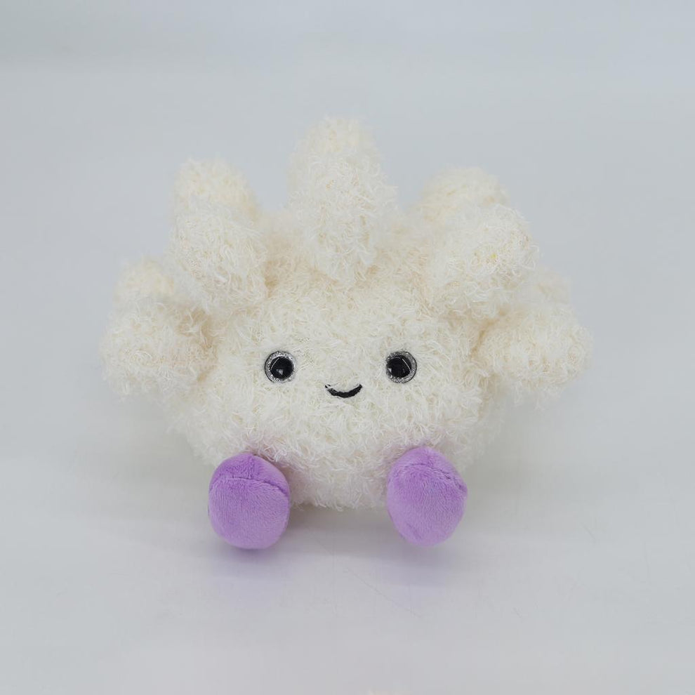 Plush toy with a happy face on a white background
