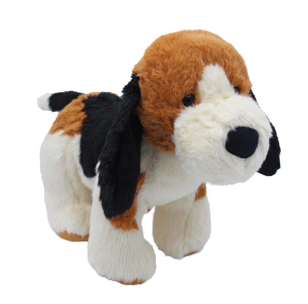Plush toy dog with brown, black, and white fur on a white background