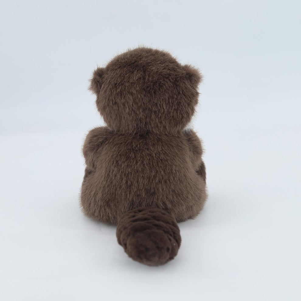 Brown sea otter with a red star on a white background back view