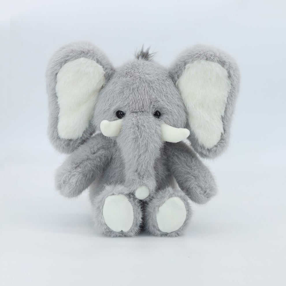 Plush elephant toy on a white background