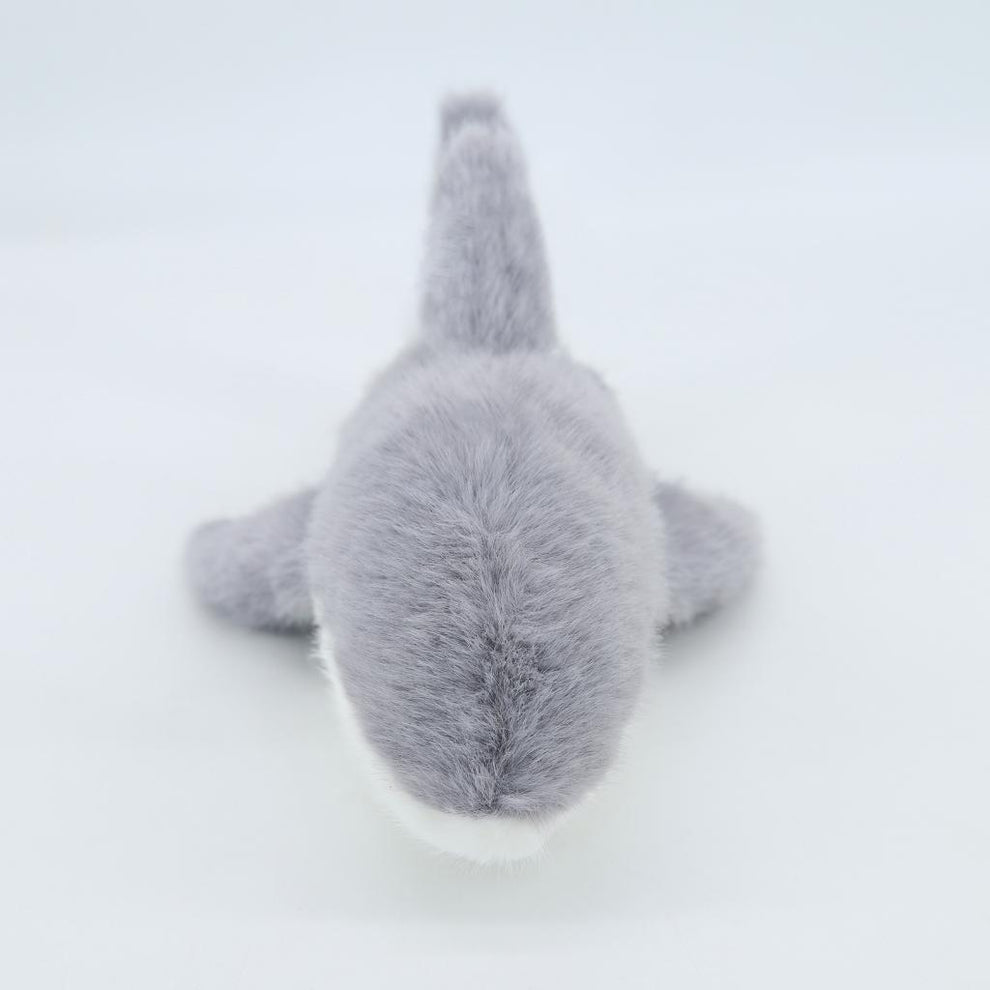Gray plush toy on a white background