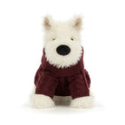 A plush dog toy wearing a burgundy cable-knit sweater, photographed against a seamless white background.