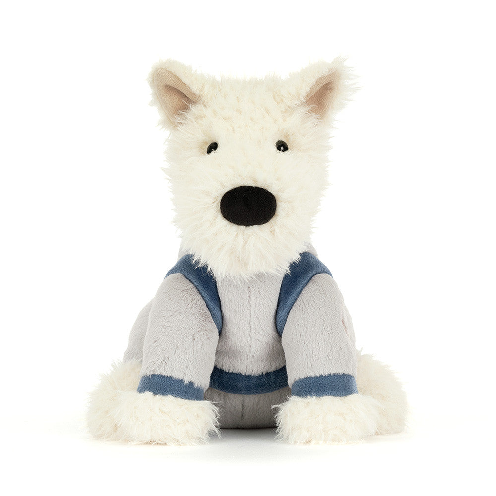 Soft white and gray plush Scottie dog toy wearing blue space suit straps, by Jellycat, front view with black nose and fluffy texture