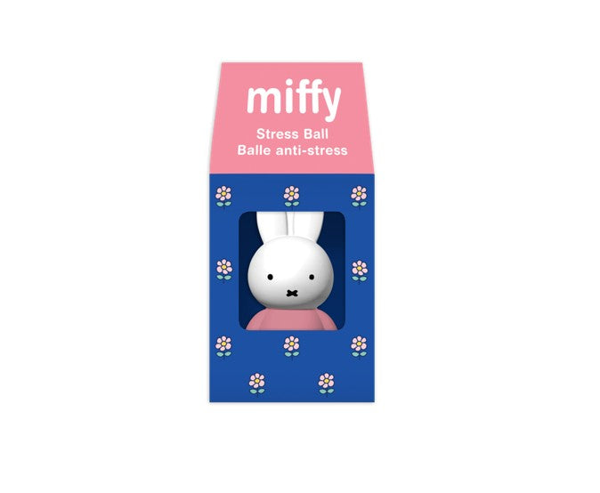 Miffy Stress Ball toy in its original packaging, featuring a white rabbit figure with a pink top peeking out of a blue box decorated with small flowers, with a pink top flap labeled 'miffy Stress Ball'.