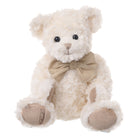 A cream-colored curly plush teddy bear with black eyes, a beige fabric bow, and beige paw pads, sitting against a plain white background.