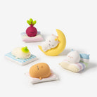 Cute sleeping animal and vegetable figures on colorful pillows, by Smoko, in pastel colors with soft textures, displayed in group shot