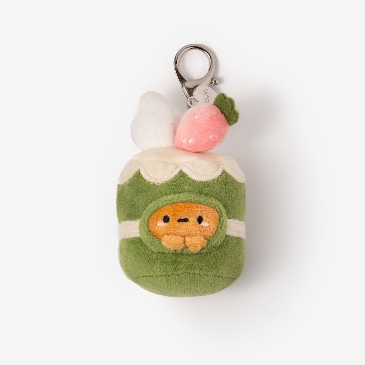 Plush keychain shaped like a green dumpling with a face on a white background