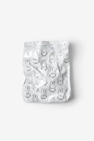Pack of baby diapers with cartoon character print on a white background