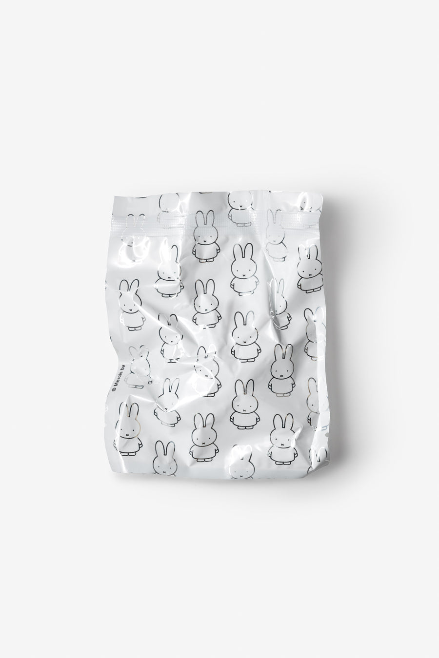 Pack of baby diapers with cartoon character print on a white background