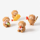 Four small figurines of a cartoon character in different poses on a white background