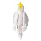Plush toy of a white bird with yellow crest on a white background