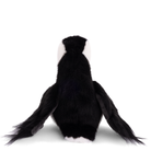 Black and white plush monkey toy on a white background