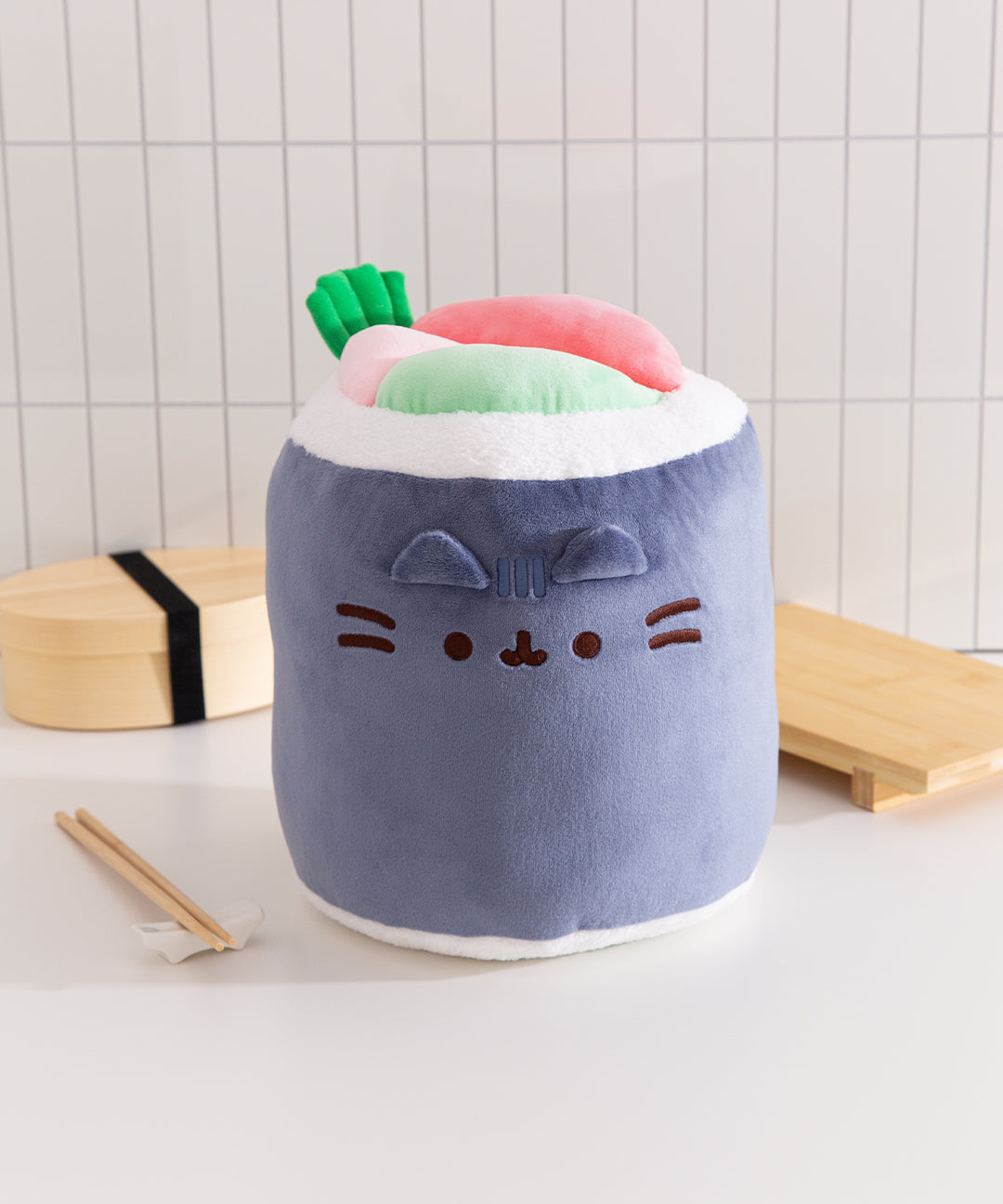 Plush toy shaped like a cat with sushi-themed ears on a white background