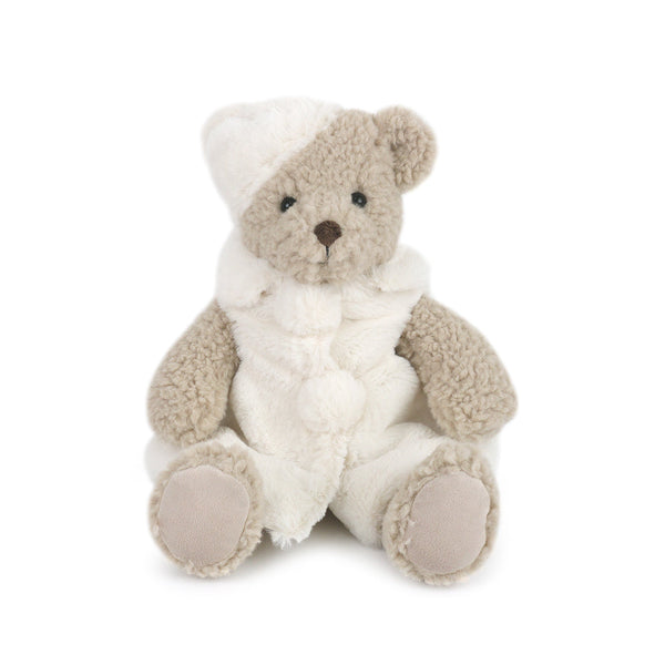 Teddy bear plush toy wearing a white hooded vest.
