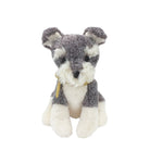 Plush toy dog with gray and white fur on a white background